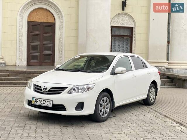 Белый Тойота Королла, объемом двигателя 1.33 л и пробегом 300 тыс. км за 5250 $, фото 1 на Automoto.ua