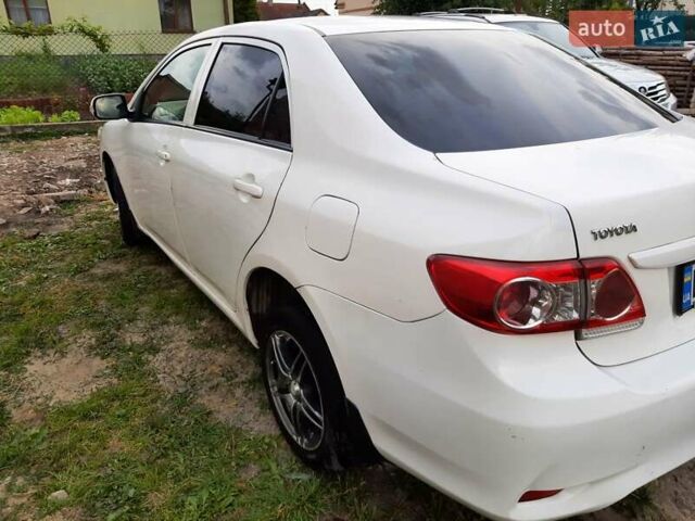 Белый Тойота Королла, объемом двигателя 1.3 л и пробегом 209 тыс. км за 6500 $, фото 5 на Automoto.ua