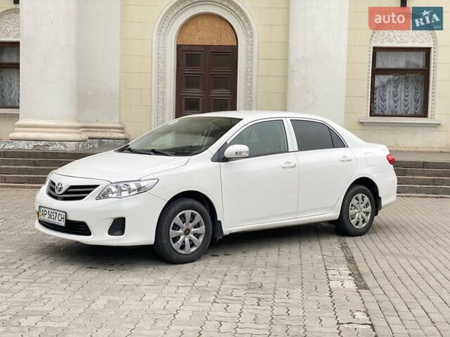 Белый Тойота Королла, объемом двигателя 1.33 л и пробегом 300 тыс. км за 5250 $, фото 2 на Automoto.ua