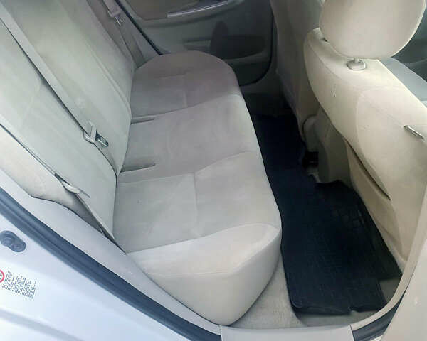 Белый Тойота Королла, объемом двигателя 1.8 л и пробегом 220 тыс. км за 7999 $, фото 7 на Automoto.ua