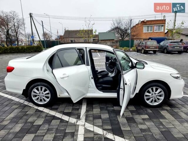 Білий Тойота Королла, об'ємом двигуна 1.6 л та пробігом 97 тис. км за 11300 $, фото 16 на Automoto.ua