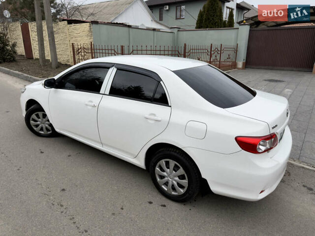 Белый Тойота Королла, объемом двигателя 1.33 л и пробегом 149 тыс. км за 6800 $, фото 16 на Automoto.ua