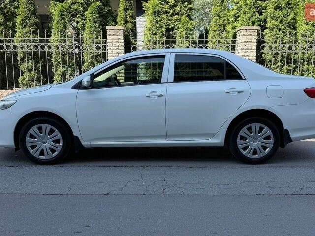 Белый Тойота Королла, объемом двигателя 1.6 л и пробегом 131 тыс. км за 9450 $, фото 4 на Automoto.ua