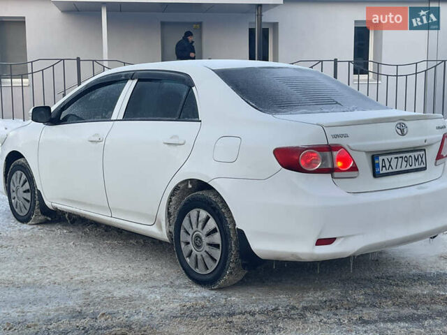 Белый Тойота Королла, объемом двигателя 1.33 л и пробегом 205 тыс. км за 6700 $, фото 5 на Automoto.ua