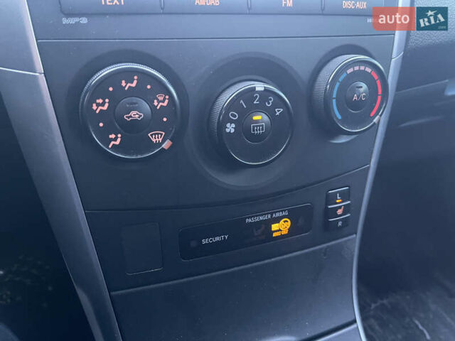 Белый Тойота Королла, объемом двигателя 1.33 л и пробегом 205 тыс. км за 6900 $, фото 10 на Automoto.ua