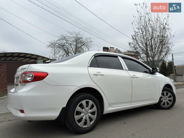 Белый Тойота Королла, объемом двигателя 1.33 л и пробегом 149 тыс. км за 6800 $, фото 10 на Automoto.ua