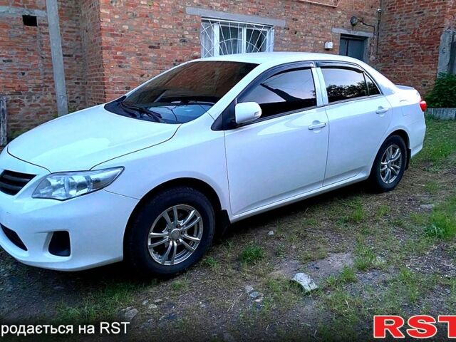 Білий Тойота Королла, об'ємом двигуна 1.3 л та пробігом 308 тис. км за 7200 $, фото 5 на Automoto.ua