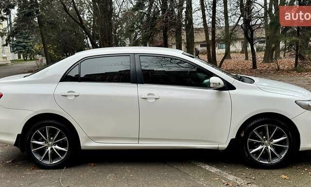 Белый Тойота Королла, объемом двигателя 1.6 л и пробегом 163 тыс. км за 9500 $, фото 4 на Automoto.ua