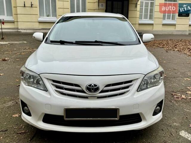 Белый Тойота Королла, объемом двигателя 1.6 л и пробегом 163 тыс. км за 9500 $, фото 5 на Automoto.ua