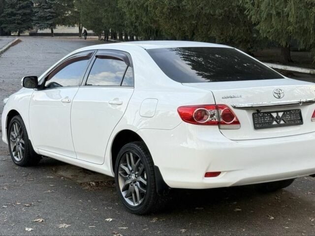 Белый Тойота Королла, объемом двигателя 1.6 л и пробегом 93 тыс. км за 10500 $, фото 4 на Automoto.ua