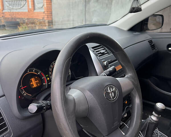 Белый Тойота Королла, объемом двигателя 1.3 л и пробегом 305 тыс. км за 8100 $, фото 9 на Automoto.ua