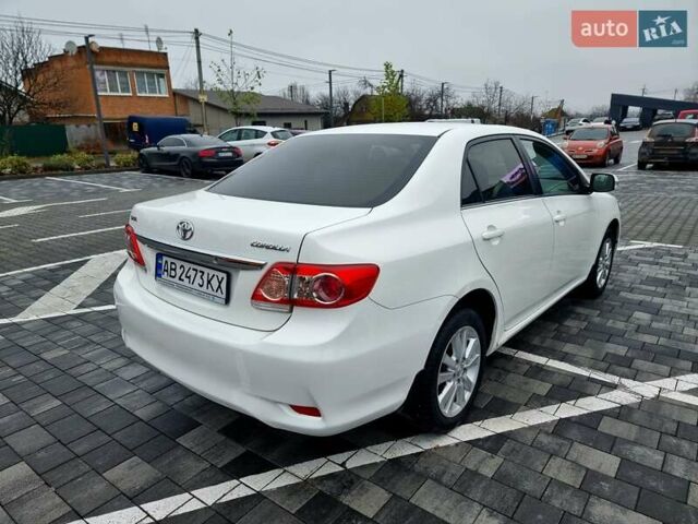 Білий Тойота Королла, об'ємом двигуна 1.6 л та пробігом 97 тис. км за 11300 $, фото 23 на Automoto.ua