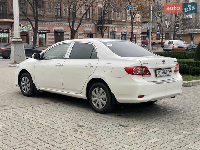Белый Тойота Королла, объемом двигателя 1.33 л и пробегом 300 тыс. км за 5250 $, фото 5 на Automoto.ua