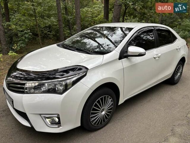 Білий Тойота Королла, об'ємом двигуна 1.6 л та пробігом 220 тис. км за 9777 $, фото 9 на Automoto.ua