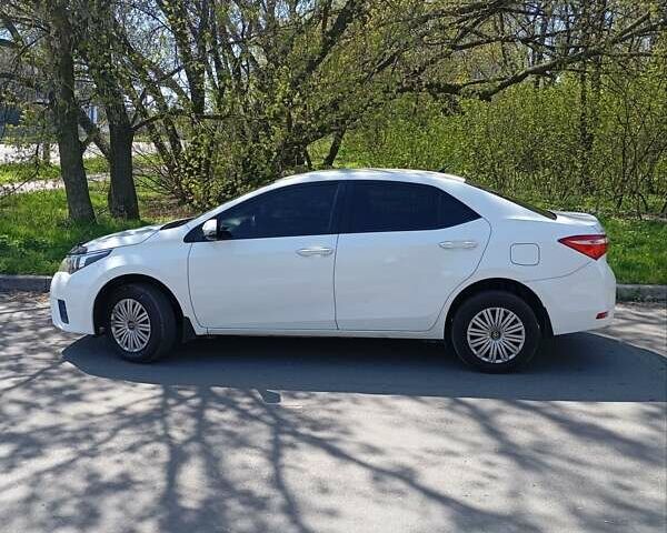 Белый Тойота Королла, объемом двигателя 1.3 л и пробегом 140 тыс. км за 9800 $, фото 5 на Automoto.ua