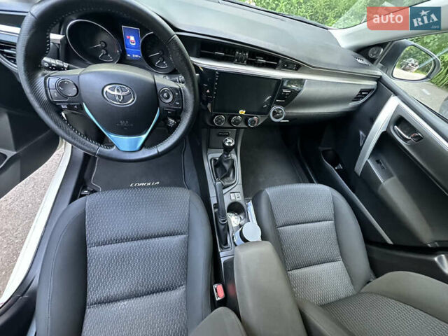 Белый Тойота Королла, объемом двигателя 1.6 л и пробегом 318 тыс. км за 12500 $, фото 14 на Automoto.ua