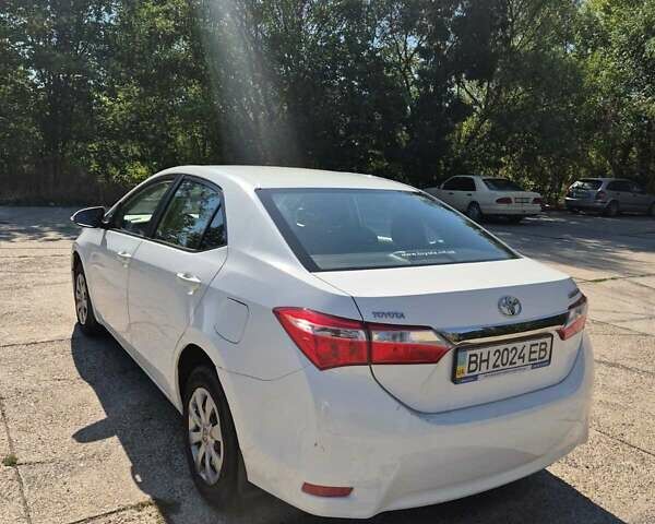 Белый Тойота Королла, объемом двигателя 1.6 л и пробегом 233 тыс. км за 9900 $, фото 1 на Automoto.ua