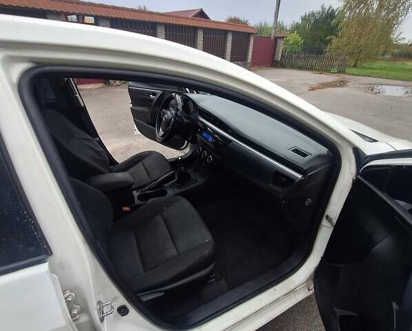 Белый Тойота Королла, объемом двигателя 1.33 л и пробегом 376 тыс. км за 6500 $, фото 16 на Automoto.ua