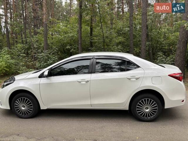 Білий Тойота Королла, об'ємом двигуна 1.6 л та пробігом 220 тис. км за 9777 $, фото 7 на Automoto.ua