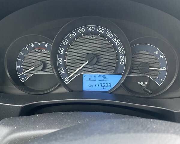 Белый Тойота Королла, объемом двигателя 1.33 л и пробегом 147 тыс. км за 11800 $, фото 6 на Automoto.ua