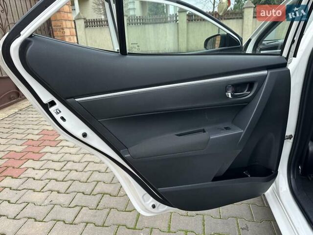 Белый Тойота Королла, объемом двигателя 1.6 л и пробегом 137 тыс. км за 10999 $, фото 54 на Automoto.ua