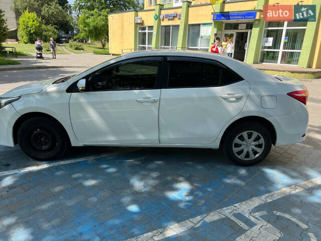 Белый Тойота Королла, объемом двигателя 1.33 л и пробегом 233 тыс. км за 6000 $, фото 5 на Automoto.ua