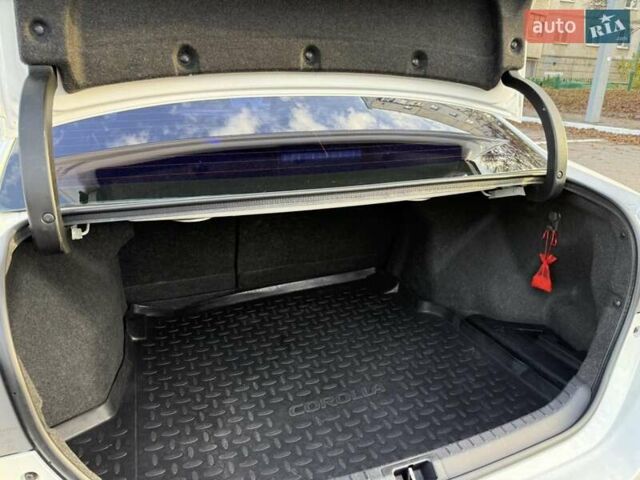 Белый Тойота Королла, объемом двигателя 1.6 л и пробегом 159 тыс. км за 12800 $, фото 18 на Automoto.ua