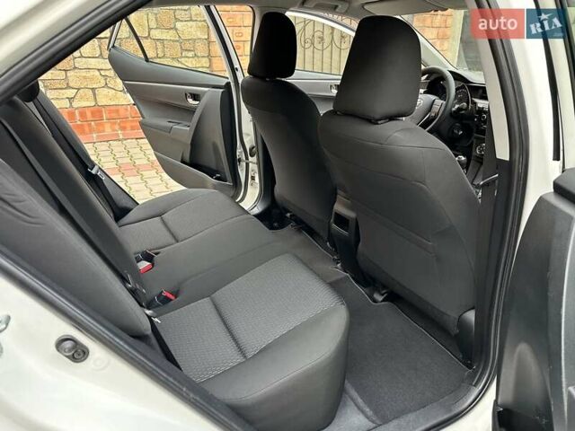 Белый Тойота Королла, объемом двигателя 1.6 л и пробегом 137 тыс. км за 10999 $, фото 53 на Automoto.ua