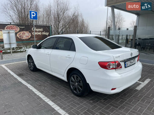 Білий Тойота Королла, об'ємом двигуна 1.6 л та пробігом 141 тис. км за 9800 $, фото 4 на Automoto.ua