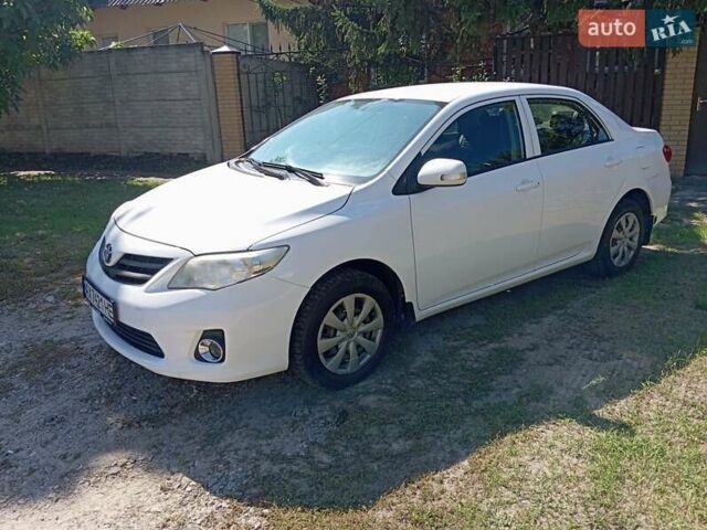 Белый Тойота Королла, объемом двигателя 1.33 л и пробегом 158 тыс. км за 7400 $, фото 4 на Automoto.ua