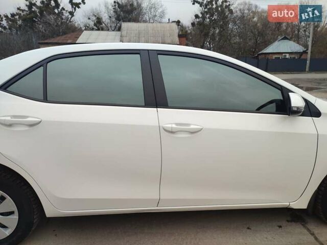 Белый Тойота Королла, объемом двигателя 1.3 л и пробегом 150 тыс. км за 10500 $, фото 11 на Automoto.ua