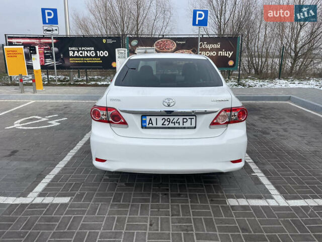 Білий Тойота Королла, об'ємом двигуна 1.6 л та пробігом 141 тис. км за 9800 $, фото 3 на Automoto.ua