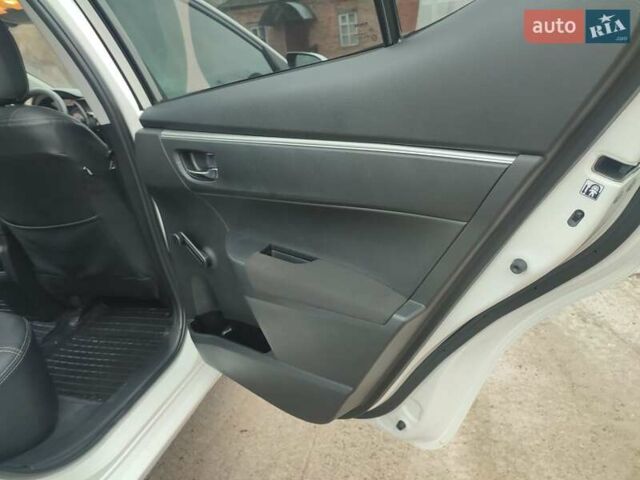 Белый Тойота Королла, объемом двигателя 1.3 л и пробегом 150 тыс. км за 10500 $, фото 29 на Automoto.ua