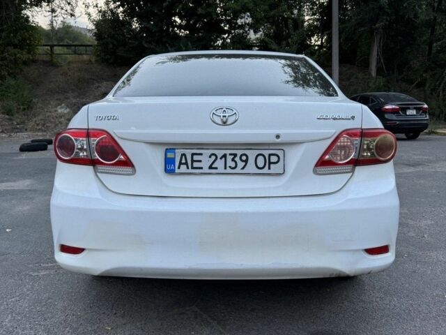 Белый Тойота Королла, объемом двигателя 1.3 л и пробегом 210 тыс. км за 7900 $, фото 1 на Automoto.ua