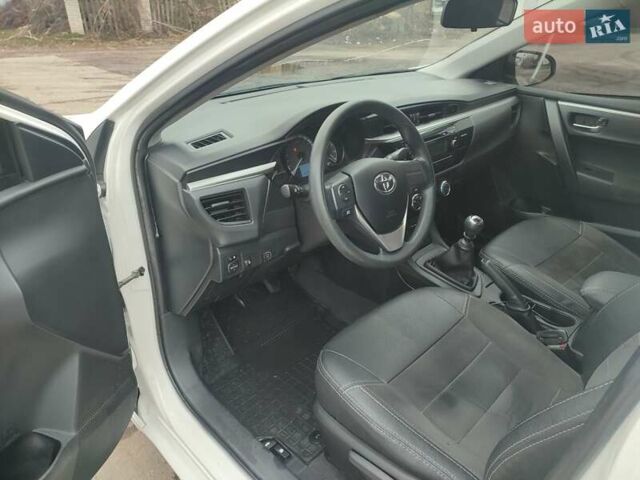 Белый Тойота Королла, объемом двигателя 1.3 л и пробегом 150 тыс. км за 10500 $, фото 17 на Automoto.ua