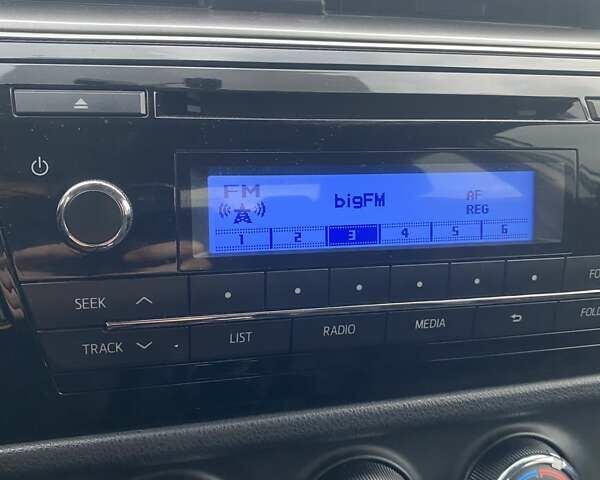 Белый Тойота Королла, объемом двигателя 1.33 л и пробегом 147 тыс. км за 11800 $, фото 5 на Automoto.ua