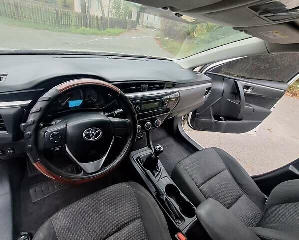 Белый Тойота Королла, объемом двигателя 1.33 л и пробегом 376 тыс. км за 6500 $, фото 14 на Automoto.ua