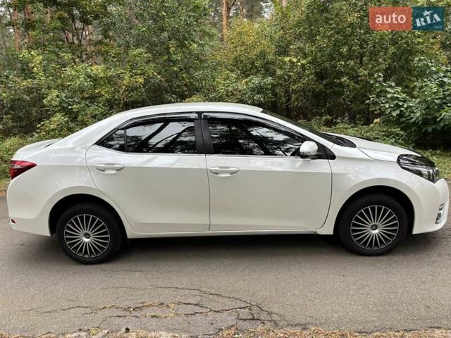 Білий Тойота Королла, об'ємом двигуна 1.6 л та пробігом 220 тис. км за 9777 $, фото 2 на Automoto.ua