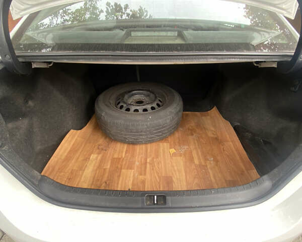 Білий Тойота Королла, об'ємом двигуна 1.33 л та пробігом 91 тис. км за 11500 $, фото 5 на Automoto.ua