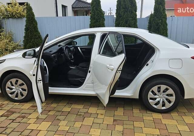 Білий Тойота Королла, об'ємом двигуна 1.6 л та пробігом 196 тис. км за 12900 $, фото 1 на Automoto.ua