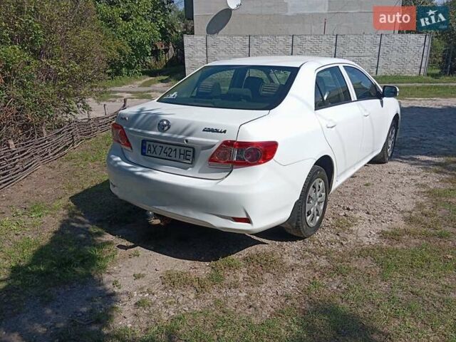 Белый Тойота Королла, объемом двигателя 1.33 л и пробегом 158 тыс. км за 7400 $, фото 6 на Automoto.ua