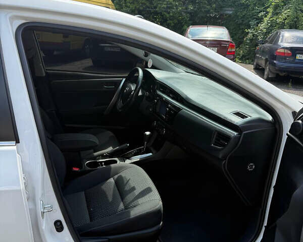 Белый Тойота Королла, объемом двигателя 1.6 л и пробегом 190 тыс. км за 12500 $, фото 9 на Automoto.ua