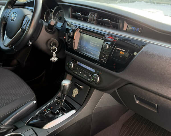 Білий Тойота Королла, об'ємом двигуна 1.6 л та пробігом 119 тис. км за 13500 $, фото 17 на Automoto.ua