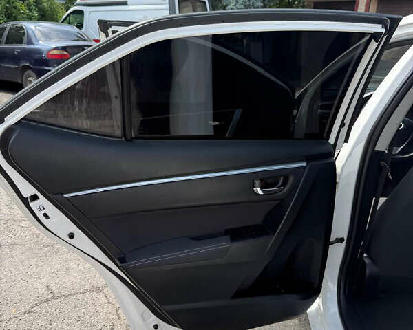 Белый Тойота Королла, объемом двигателя 1.6 л и пробегом 190 тыс. км за 12500 $, фото 14 на Automoto.ua