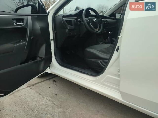 Белый Тойота Королла, объемом двигателя 1.3 л и пробегом 150 тыс. км за 10500 $, фото 16 на Automoto.ua