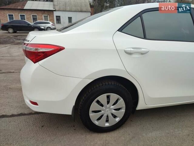 Белый Тойота Королла, объемом двигателя 1.3 л и пробегом 150 тыс. км за 10500 $, фото 10 на Automoto.ua