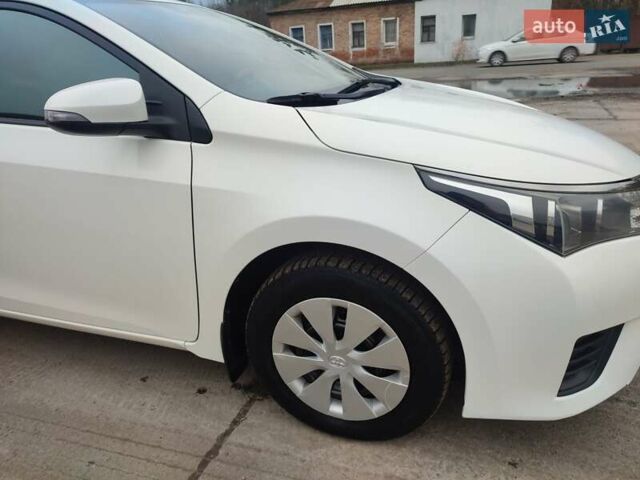 Белый Тойота Королла, объемом двигателя 1.3 л и пробегом 150 тыс. км за 10500 $, фото 9 на Automoto.ua