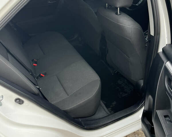 Белый Тойота Королла, объемом двигателя 1.6 л и пробегом 142 тыс. км за 12000 $, фото 24 на Automoto.ua