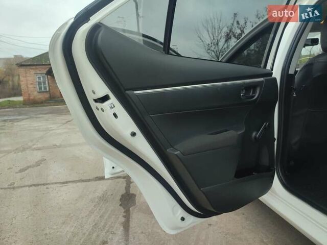 Белый Тойота Королла, объемом двигателя 1.3 л и пробегом 150 тыс. км за 10500 $, фото 20 на Automoto.ua