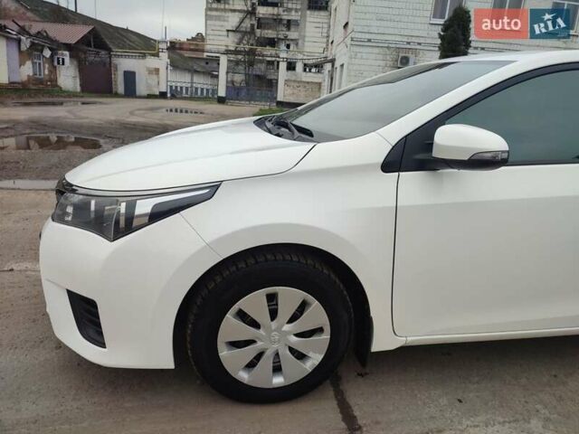 Белый Тойота Королла, объемом двигателя 1.3 л и пробегом 150 тыс. км за 10500 $, фото 5 на Automoto.ua